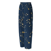 Navy blue pants with gold star constellation pattern on a white background