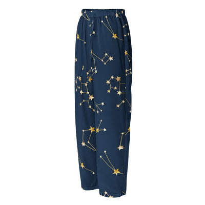 Navy blue pants with gold star constellation pattern on a white background