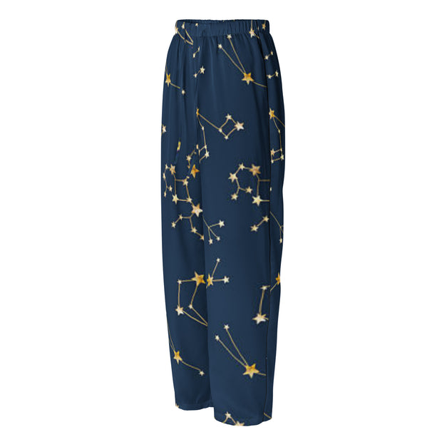 Navy blue pants with gold star constellation pattern on a white background