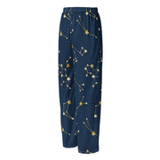 Navy blue pants with gold star constellation pattern on a white background