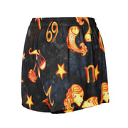 Black shorts with orange and yellow star signs and symbols on a white background